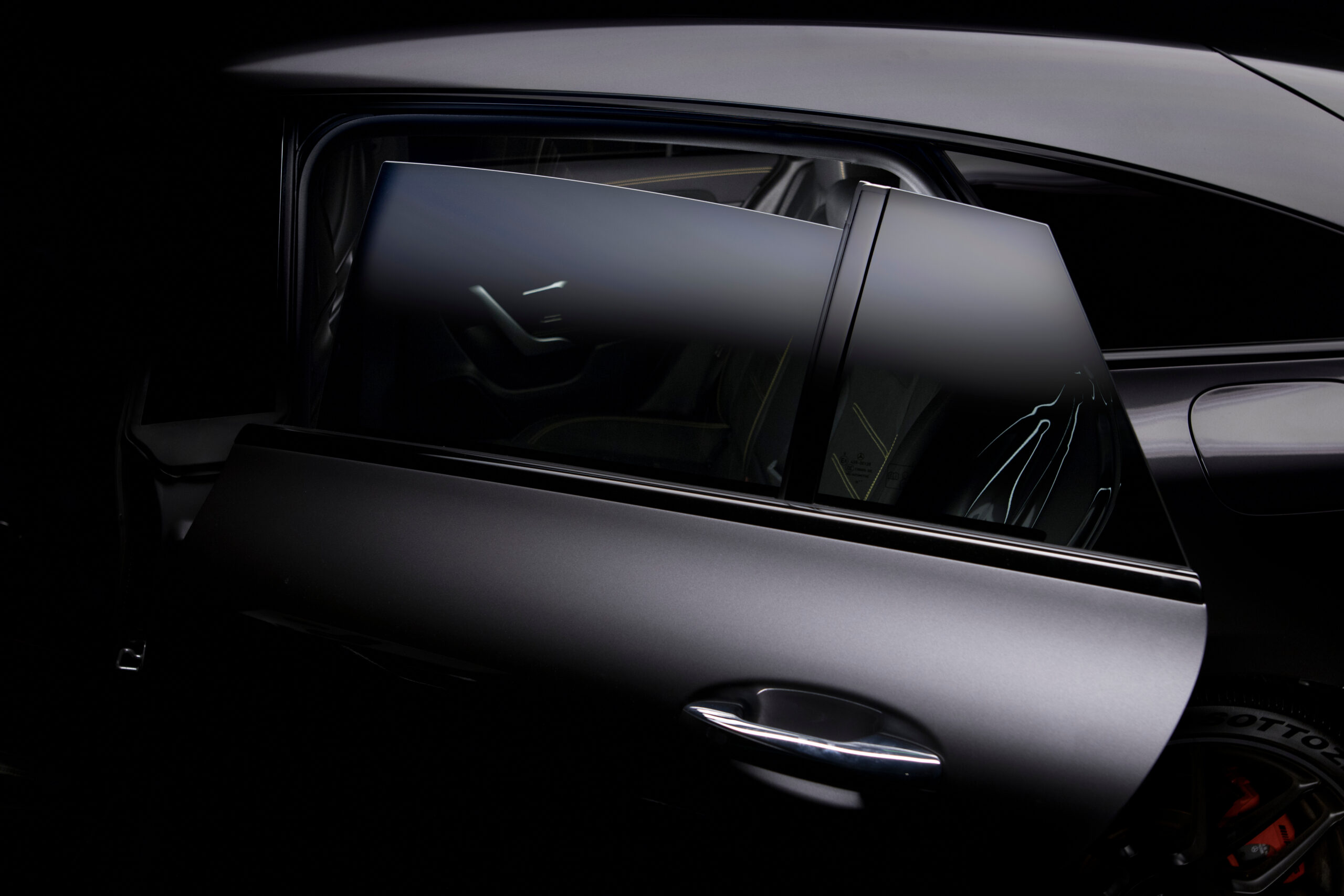 Krakow, Poland - June 14, 2024: Color: graphite or gray, Mercedes CLA 45s AMG, 241 km, year: 2020. Frameless, tinted windows. Rear windows in the doors of the Car. car Solar Glass . https://www.reflexcardetailing.it/wp-content/uploads/2026/02/AdobeStock_1036961275_Editorial_Use_Only-scaled.jpeg